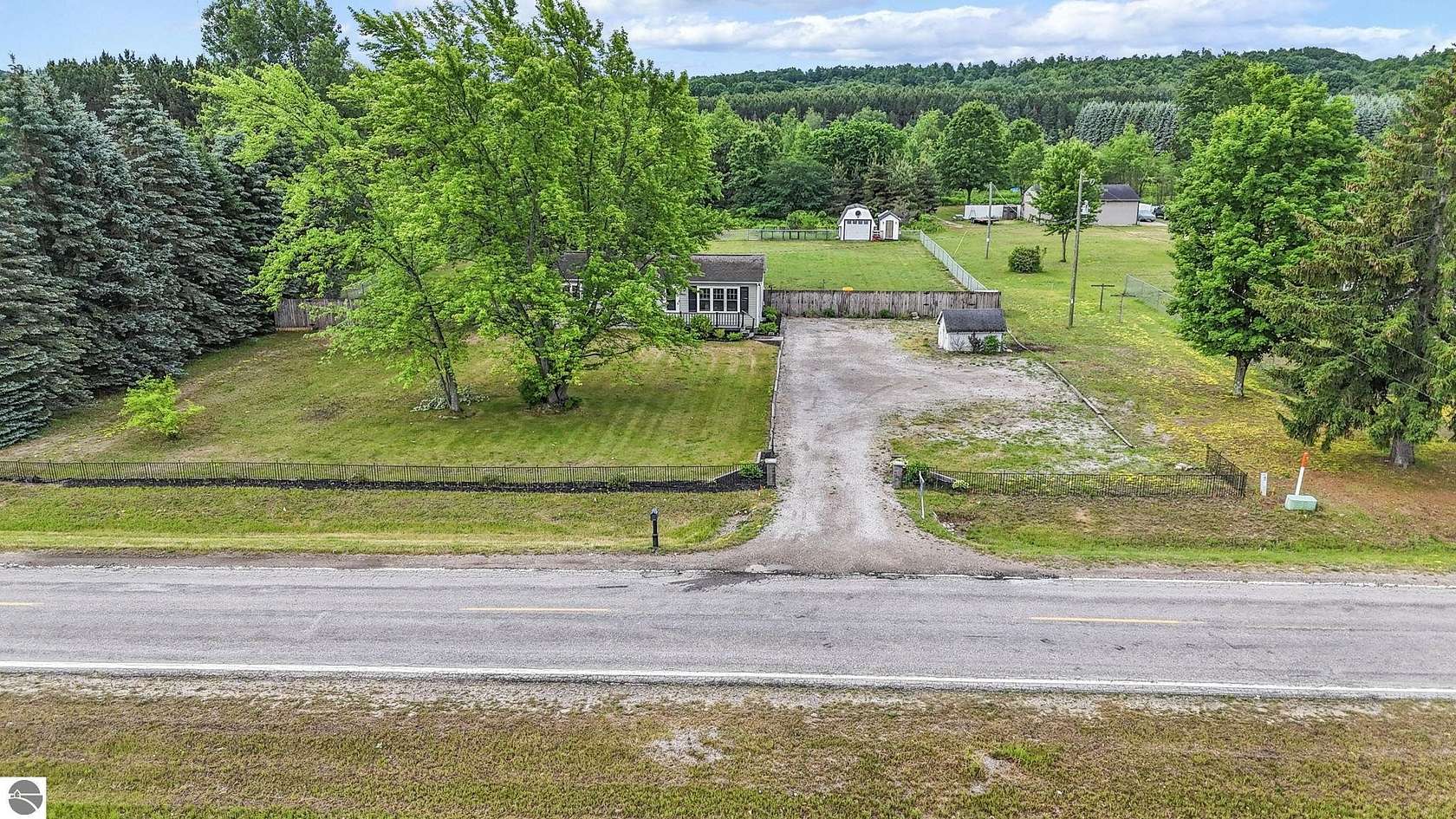 4.88 Acres of Land with Home for Sale in Grawn, Michigan