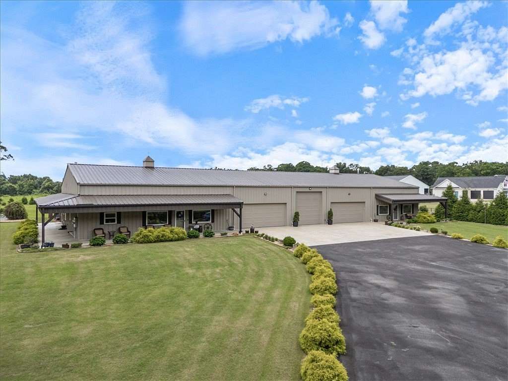 5 Acres of Land with Home for Sale in Gravette, Arkansas