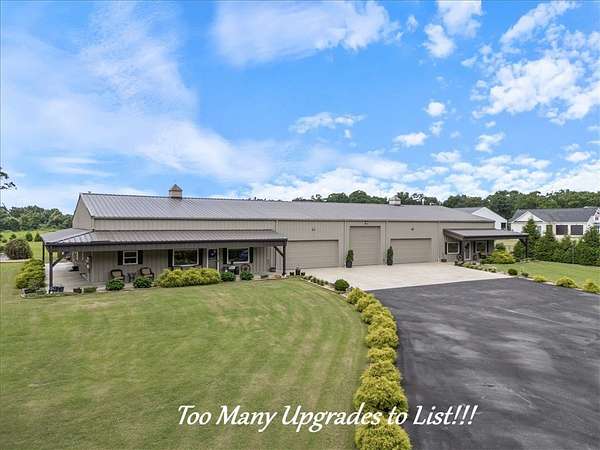 5 Acres of Land with Home for Sale in Gravette, Arkansas