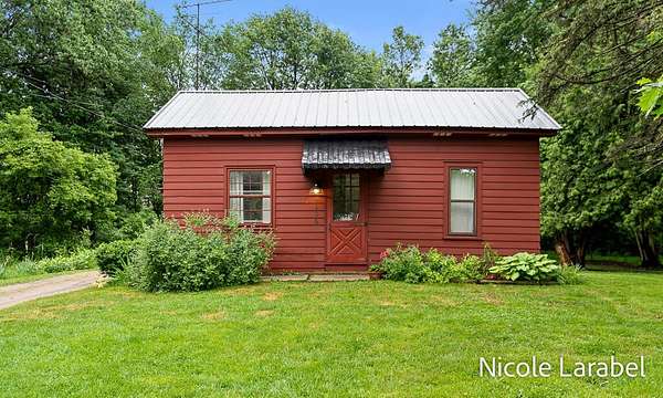 4.13 Acres of Land with Home for Sale in Cedar Springs, Michigan