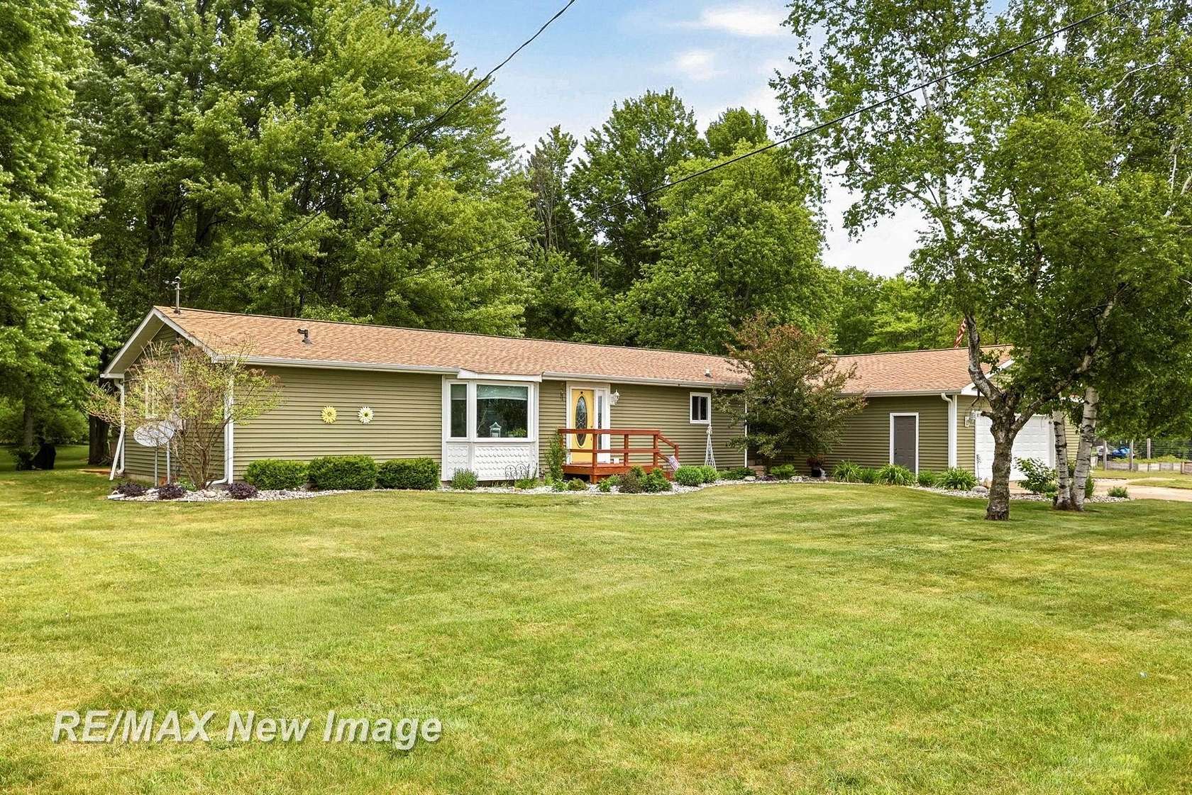 3 Acres of Land with Home for Sale in Birch Run, Michigan