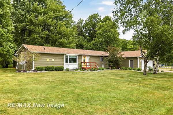 3 Acres of Land with Home for Sale in Birch Run, Michigan