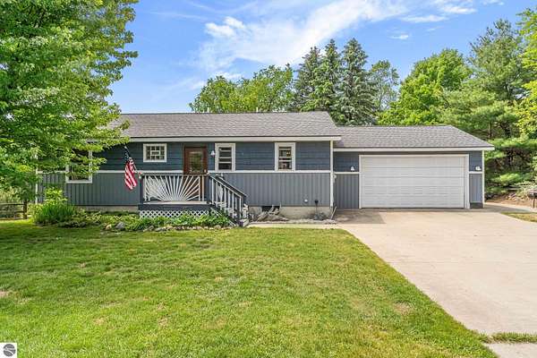 5 Acres of Land with Home for Sale in Beulah, Michigan