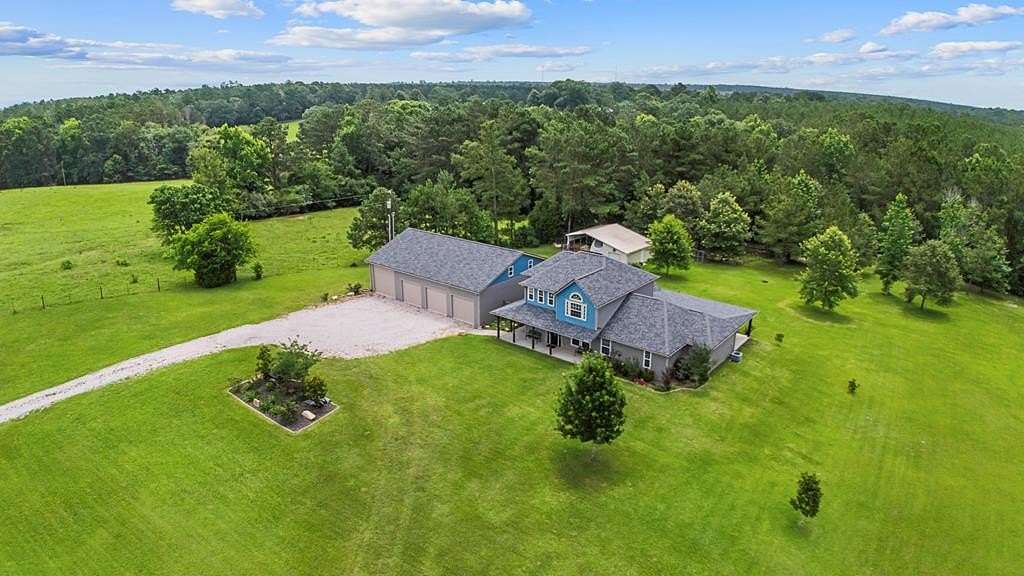 6.6 Acres of Land with Home for Sale in Jasper, Texas