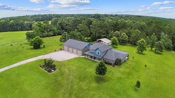 6.6 Acres of Land with Home for Sale in Jasper, Texas
