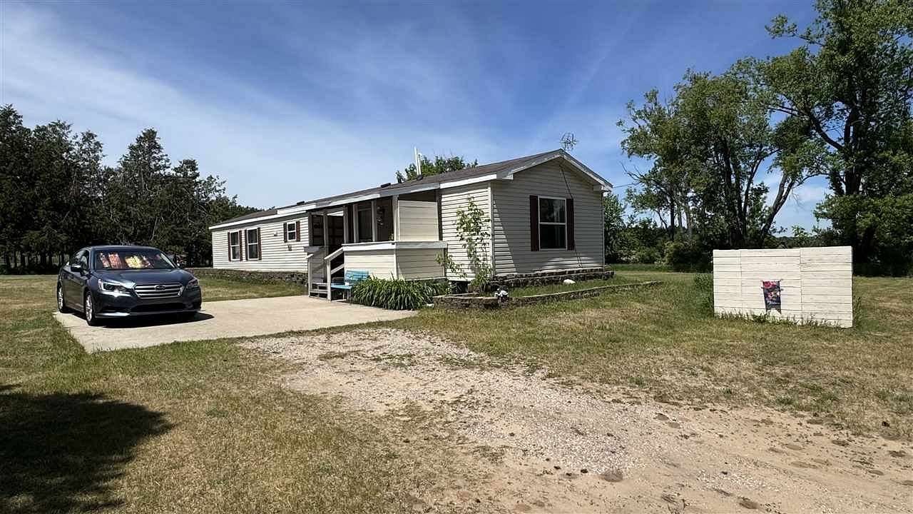 1.7 Acres of Land with Home for Sale in Brutus, Michigan