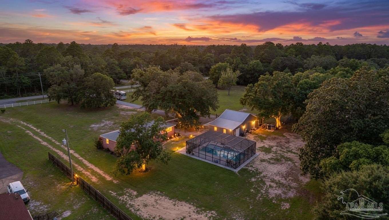 7.6 Acres of Land with Home for Sale in Milton, Florida
