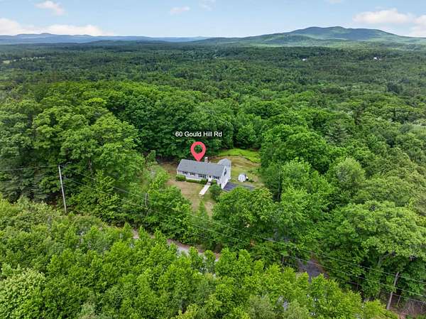 5.3 Acres of Land with Home for Sale in Greenfield, New Hampshire
