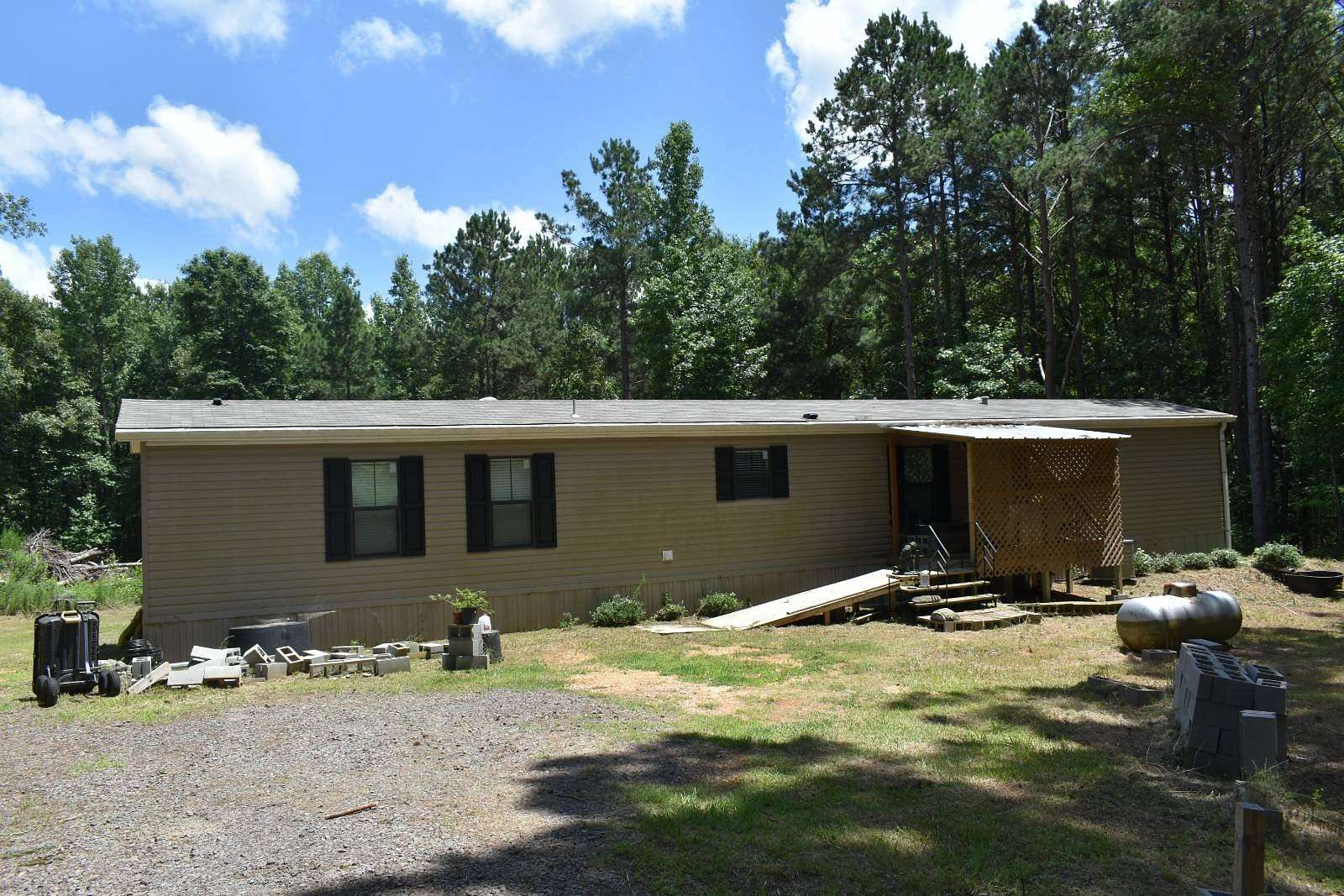 12.5 Acres of Land with Home for Sale in Magnolia, Arkansas