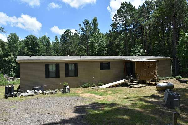 12.5 Acres of Land with Home for Sale in Magnolia, Arkansas