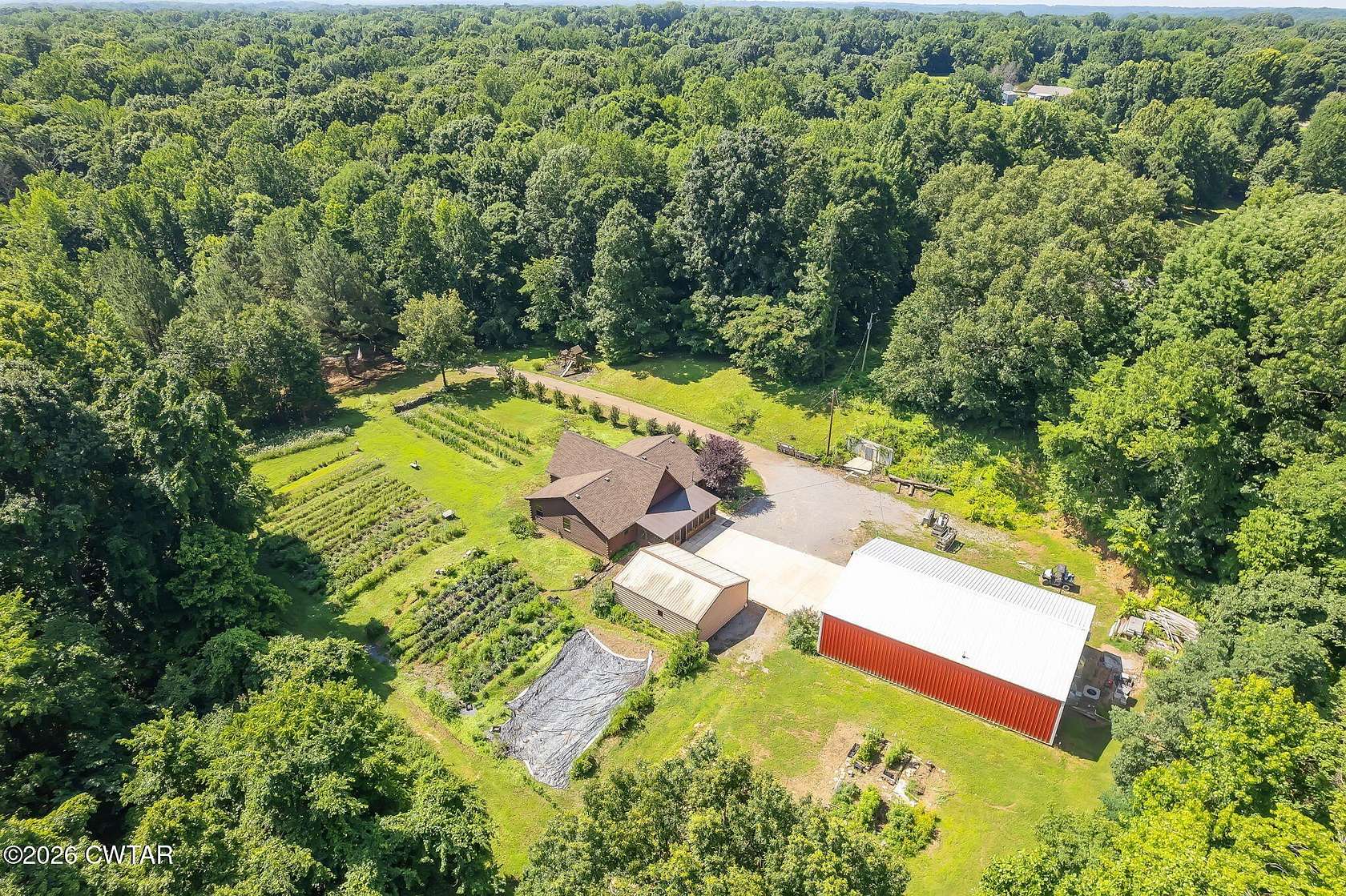 55.6 Acres of Land with Home for Sale in Ripley, Tennessee