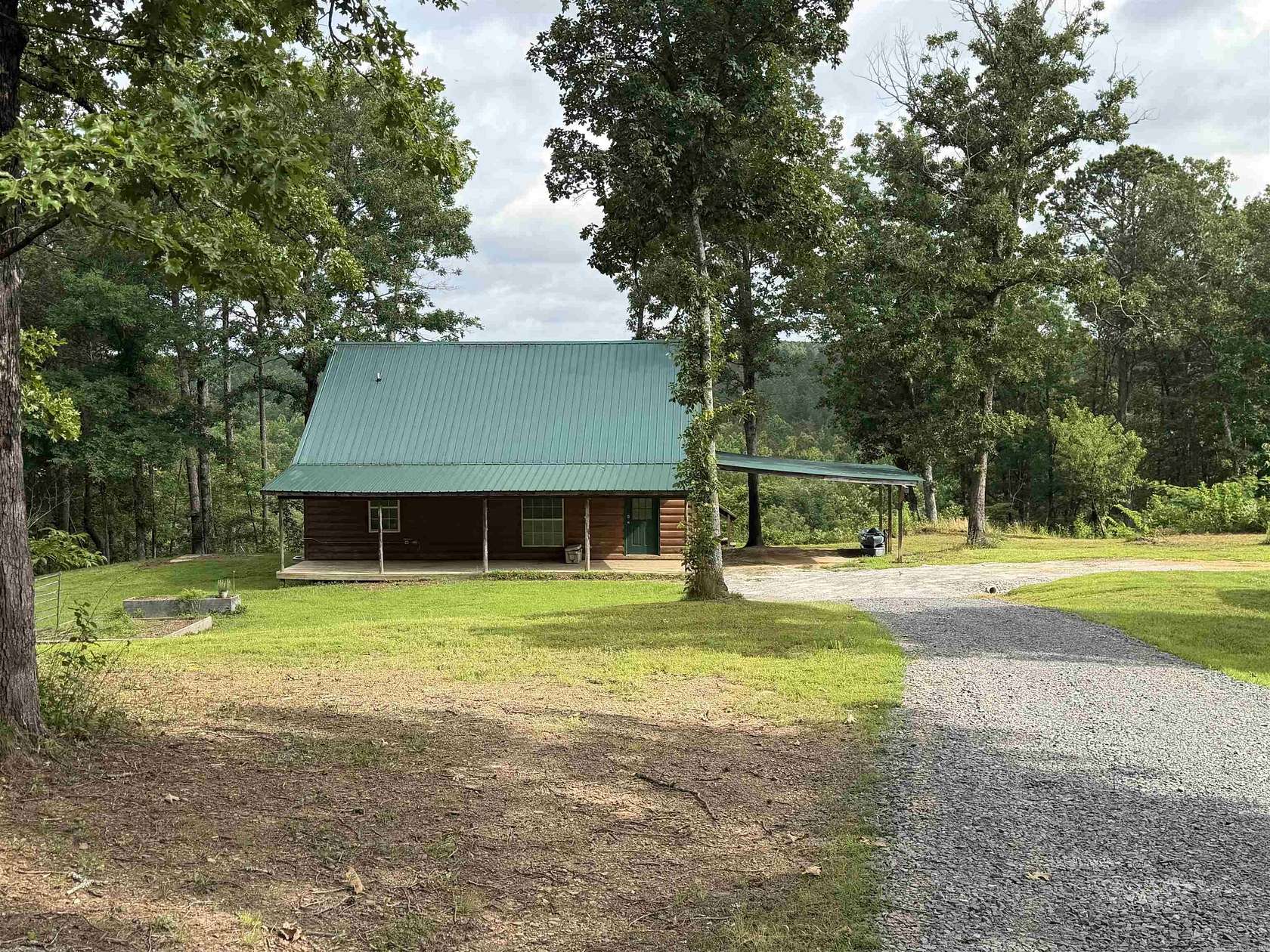 10.8 Acres of Recreational Land with Home for Sale in Damascus, Arkansas