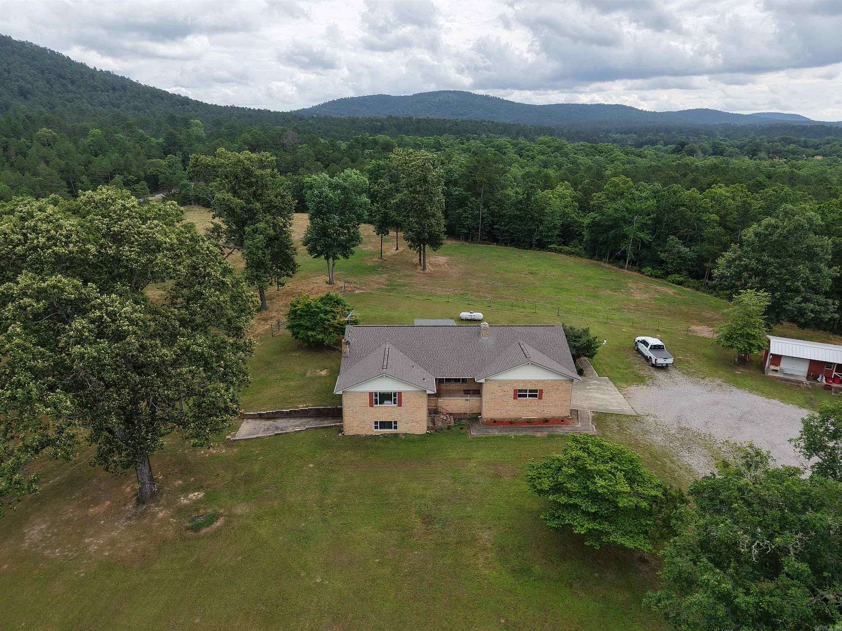 99.3 Acres of Land with Home for Sale in Sims, Arkansas