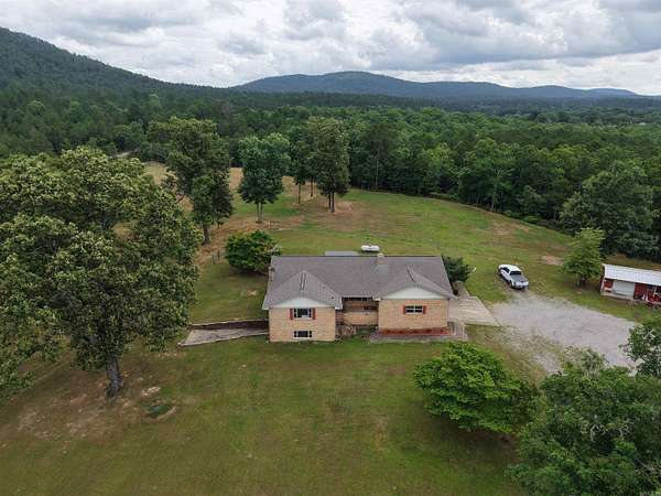 99.3 Acres of Land with Home for Sale in Sims, Arkansas