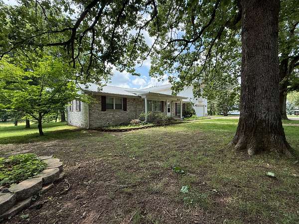 7 Acres of Land with Home for Sale in Cave City, Arkansas