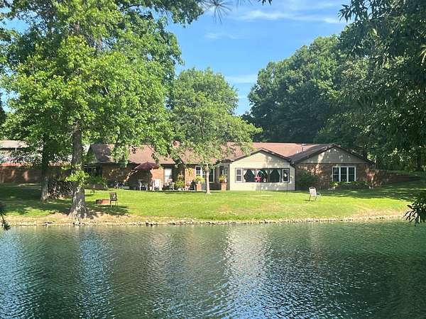 5 Acres of Land with Home for Sale in Carlinville, Illinois