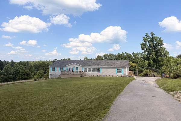 4.53 Acres of Land with Home for Sale in Red Boiling Springs, Tennessee