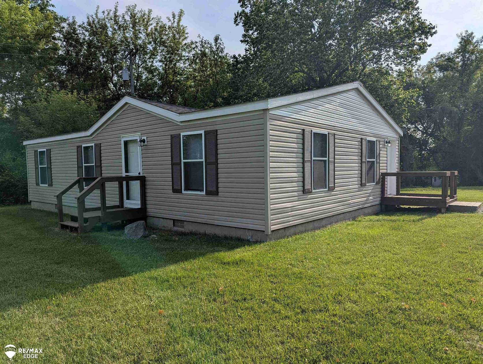 4.75 Acres of Land with Home for Sale in Otter Lake, Michigan