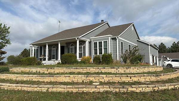 7.4 Acres of Land with Home for Sale in El Dorado, Kansas