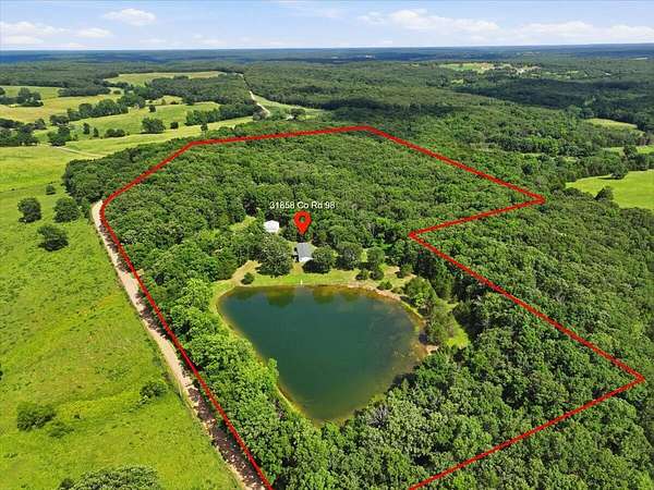 25.4 Acres of Recreational Land with Home for Sale in Cross Timbers, Missouri