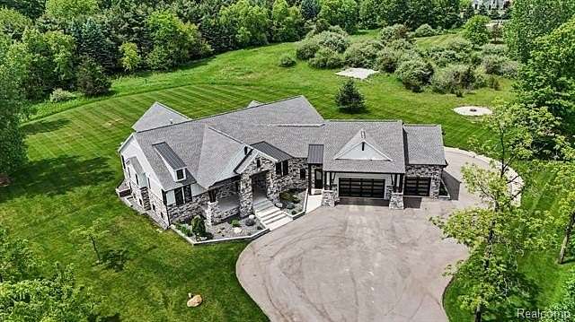 1.66 Acres of Land with Home for Sale in Springfield Township, Michigan