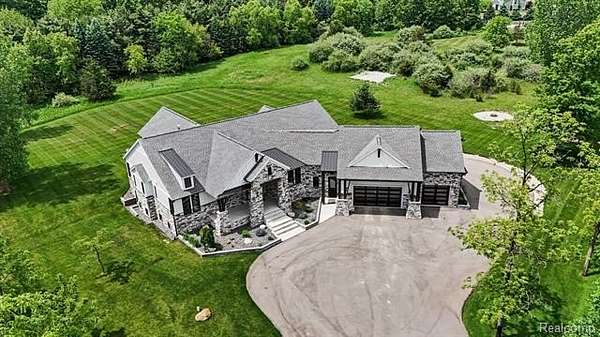 1.66 Acres of Land with Home for Sale in Springfield Township, Michigan