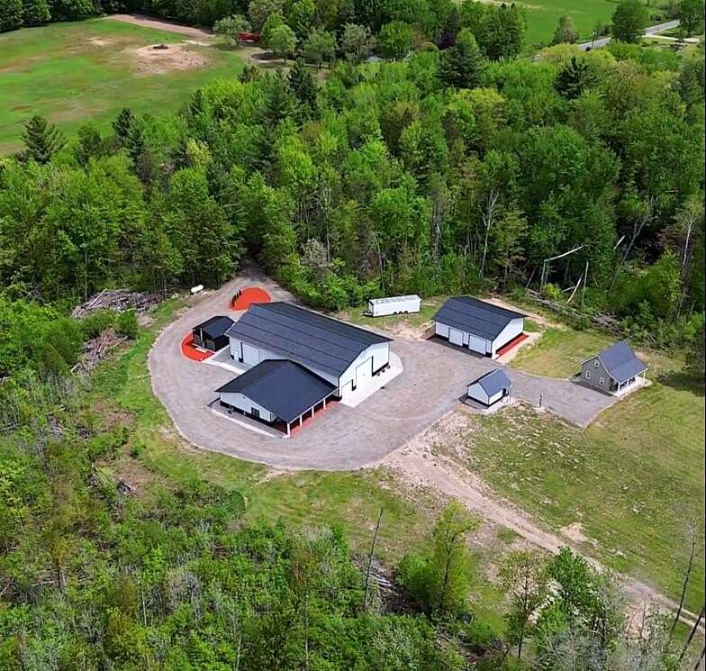 10 Acres of Recreational Land with Home for Sale in Bitely, Michigan