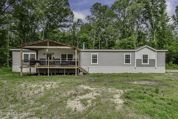 7 Acres of Land with Home for Sale in Flora, Mississippi