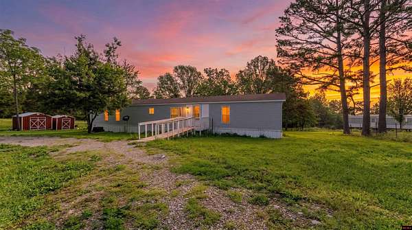 3.4 Acres of Land with Home for Sale in Pomona, Missouri