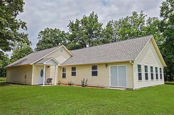10 Acres of Land with Home for Sale in Tahlequah, Oklahoma