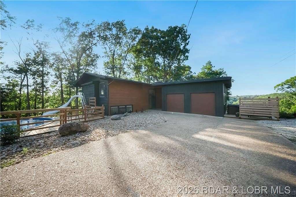 13 Acres of Recreational Land with Home for Sale in Camdenton, Missouri