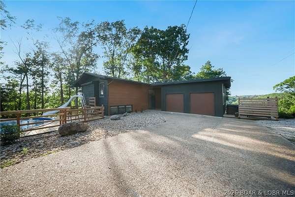 13 Acres of Recreational Land with Home for Sale in Camdenton, Missouri