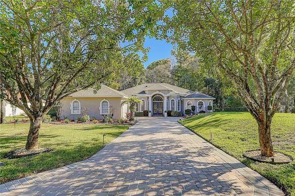 1.62 Acres of Land with Home for Sale in Spring Hill, Florida
