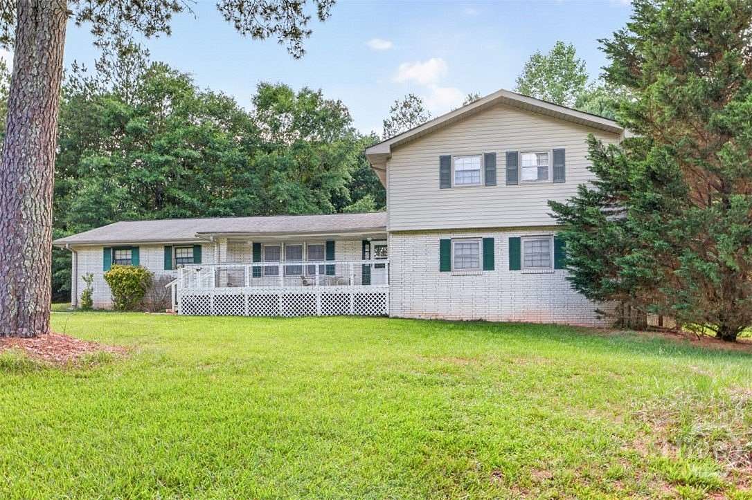 2.73 Acres of Land with Home for Sale in Loganville, Georgia