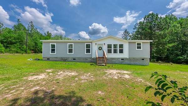 5 Acres of Land with Home for Sale in Box Springs, Georgia