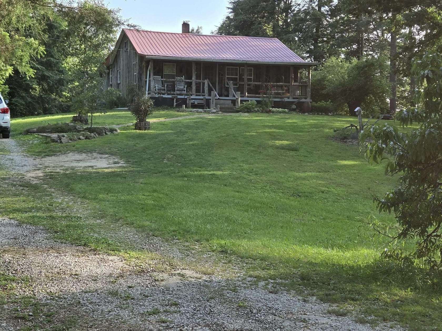 2 Acres of Land with Home for Sale in Irvine, Kentucky
