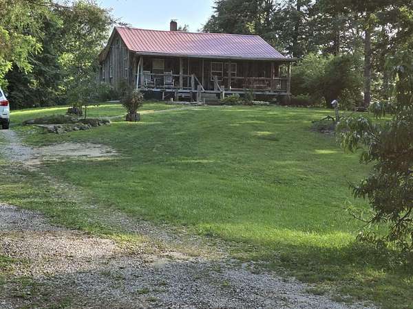 2 Acres of Land with Home for Sale in Irvine, Kentucky