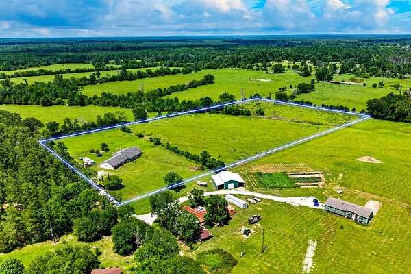 9.84 Acres of Land with Home for Sale in Apple Springs, Texas