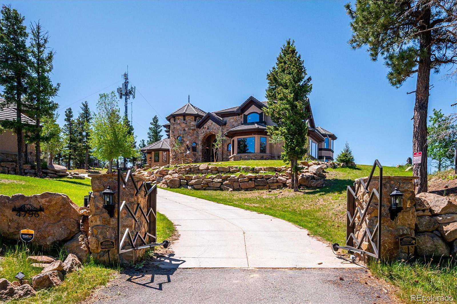 19 Acres of Land with Home for Sale in Evergreen, Colorado