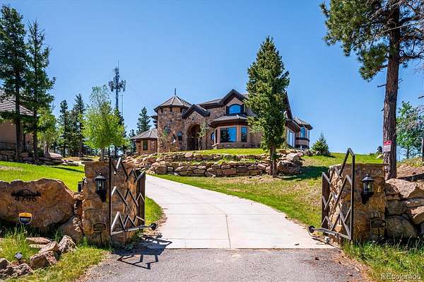 19 Acres of Land with Home for Sale in Evergreen, Colorado