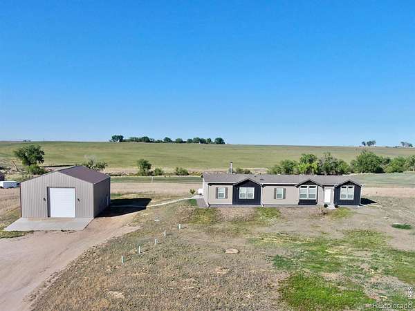 3 Acres of Land with Home for Sale in Platteville, Colorado