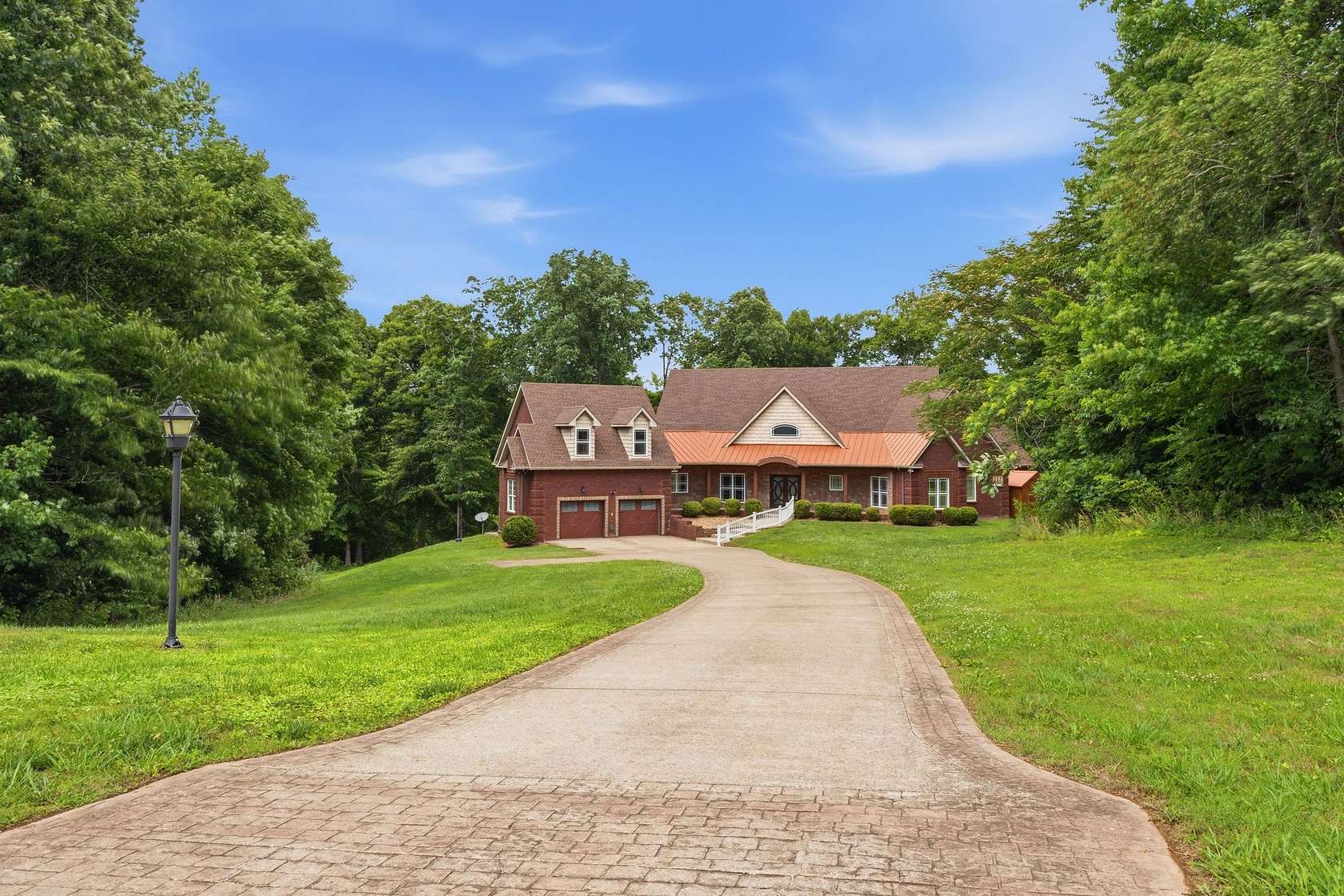 6.7 Acres of Land with Home for Sale in Adams, Tennessee