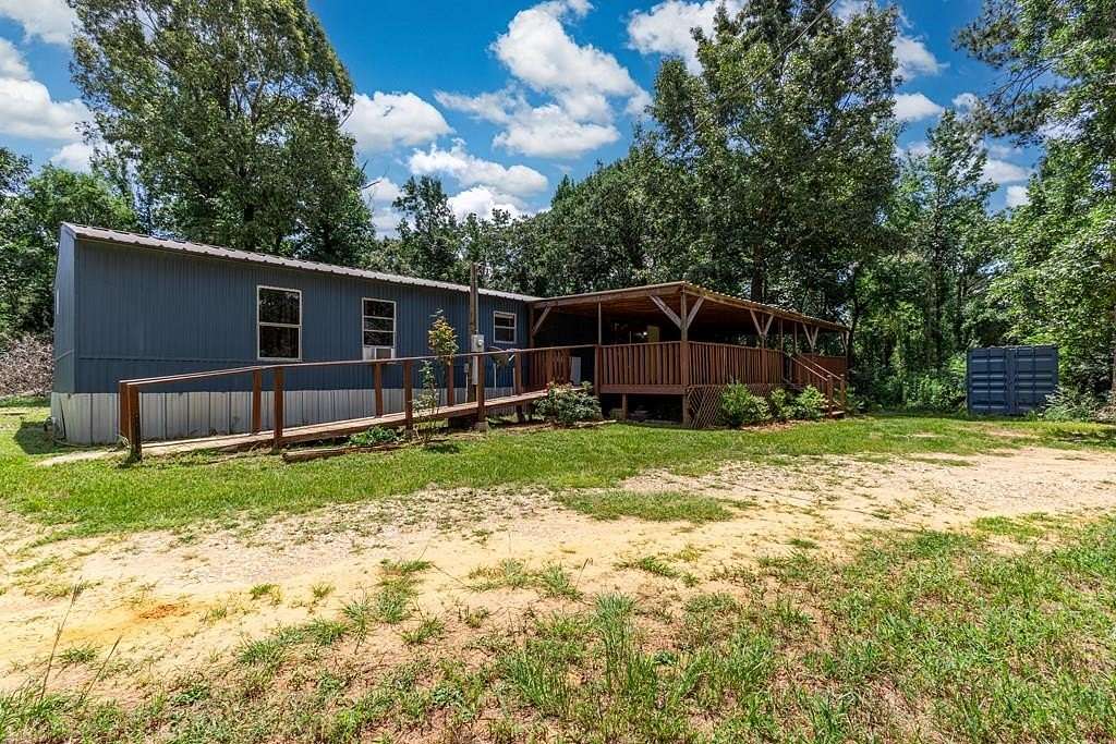6.13 Acres of Land with Home for Sale in Nacogdoches, Texas