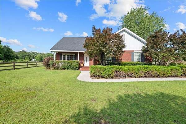 4.87 Acres of Land with Home for Sale in Grand Bay, Alabama