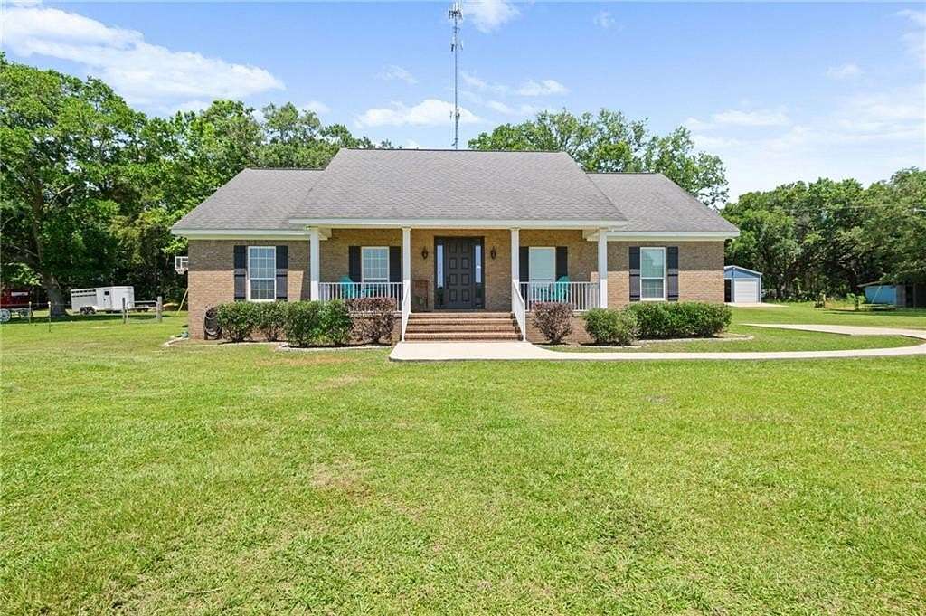 5 Acres of Land with Home for Sale in Grand Bay, Alabama