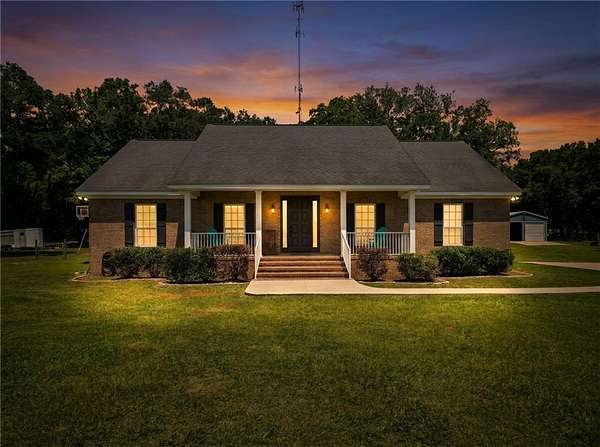 4.89 Acres of Land with Home for Sale in Grand Bay, Alabama