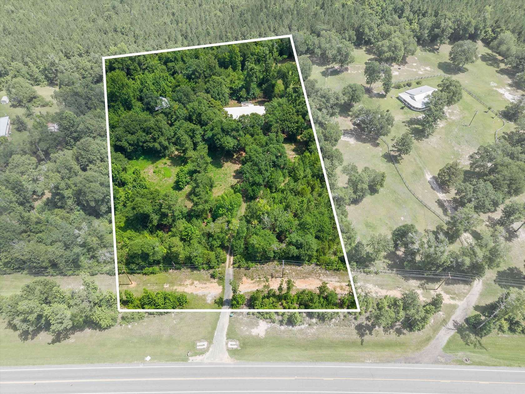4.22 Acres of Land with Home for Sale in Marianna, Florida