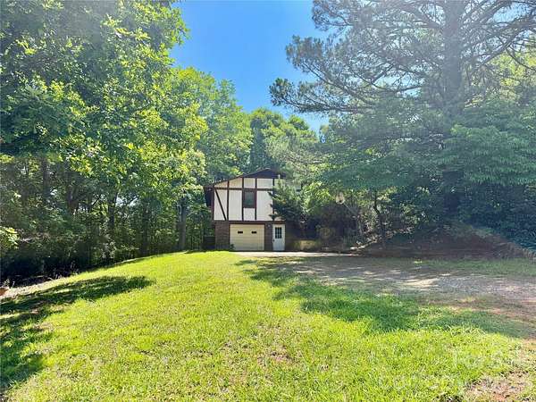 5.23 Acres of Land with Home for Sale in Nebo, North Carolina