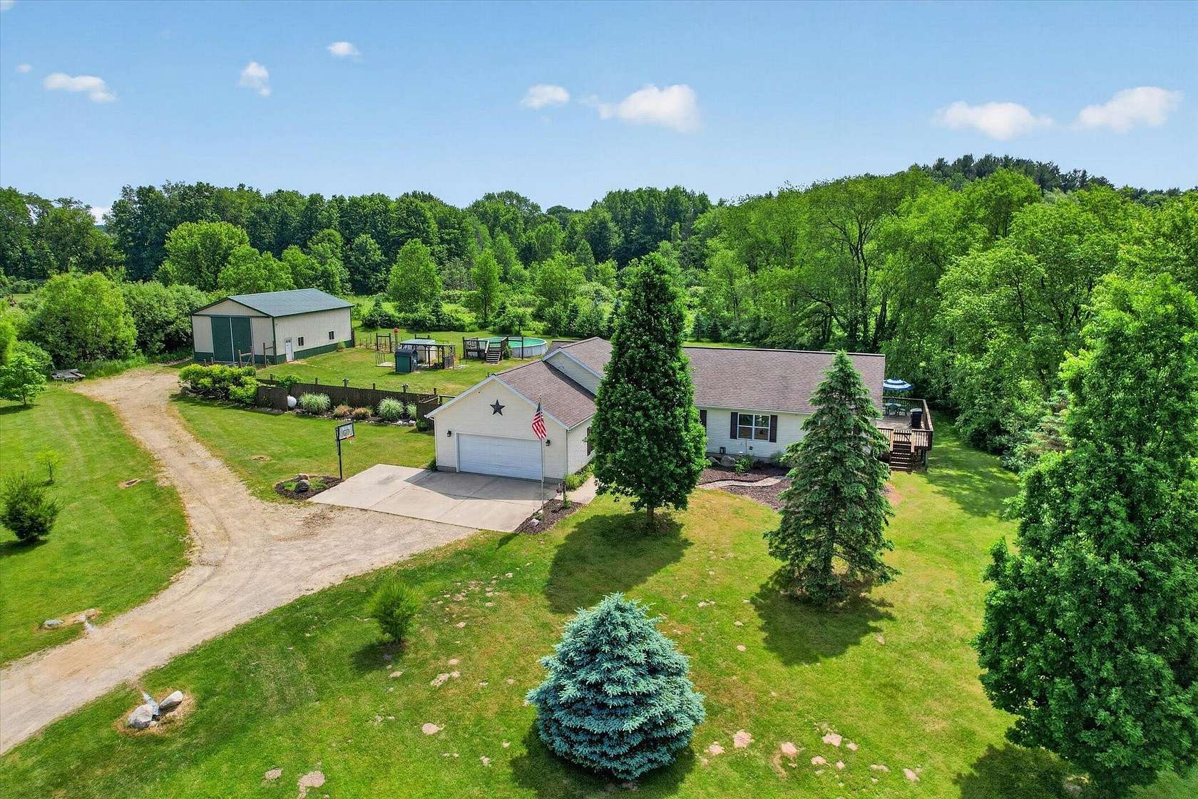 3.75 Acres of Land with Home for Sale in Saranac, Michigan