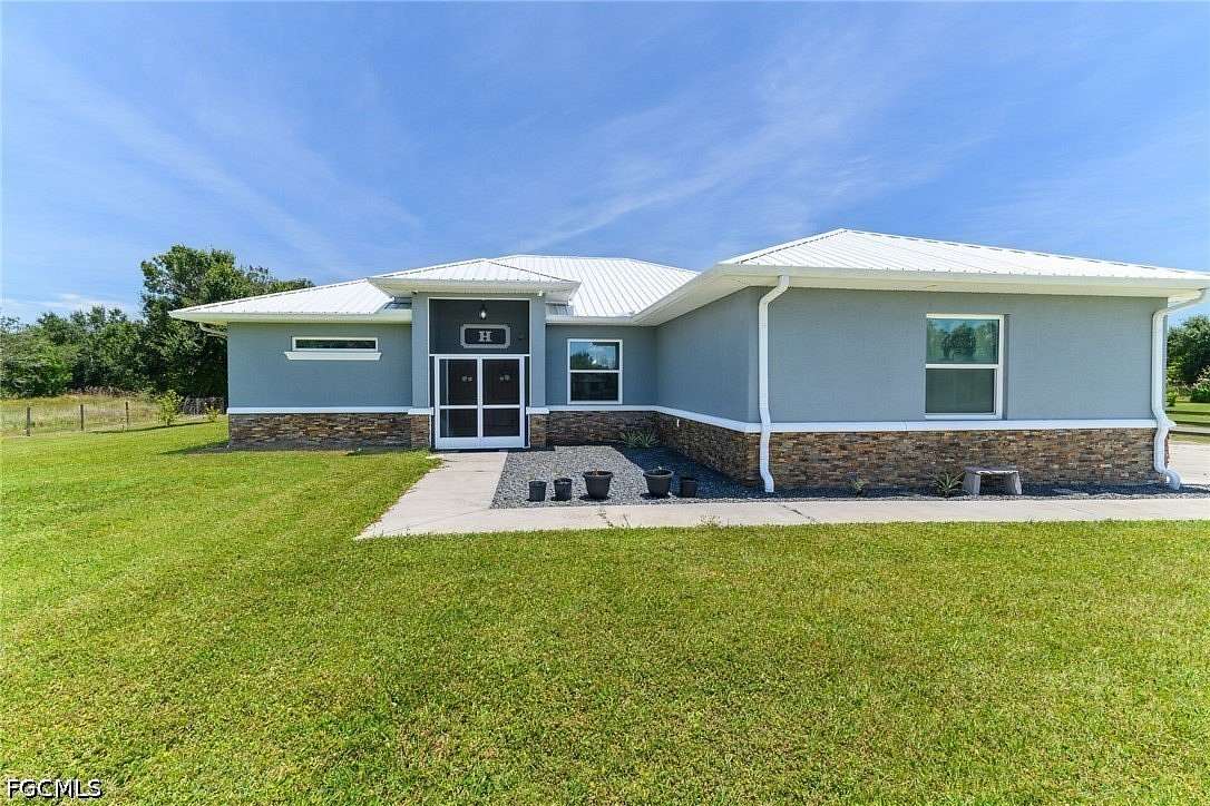 2.5 Acres of Land with Home for Sale in Punta Gorda, Florida